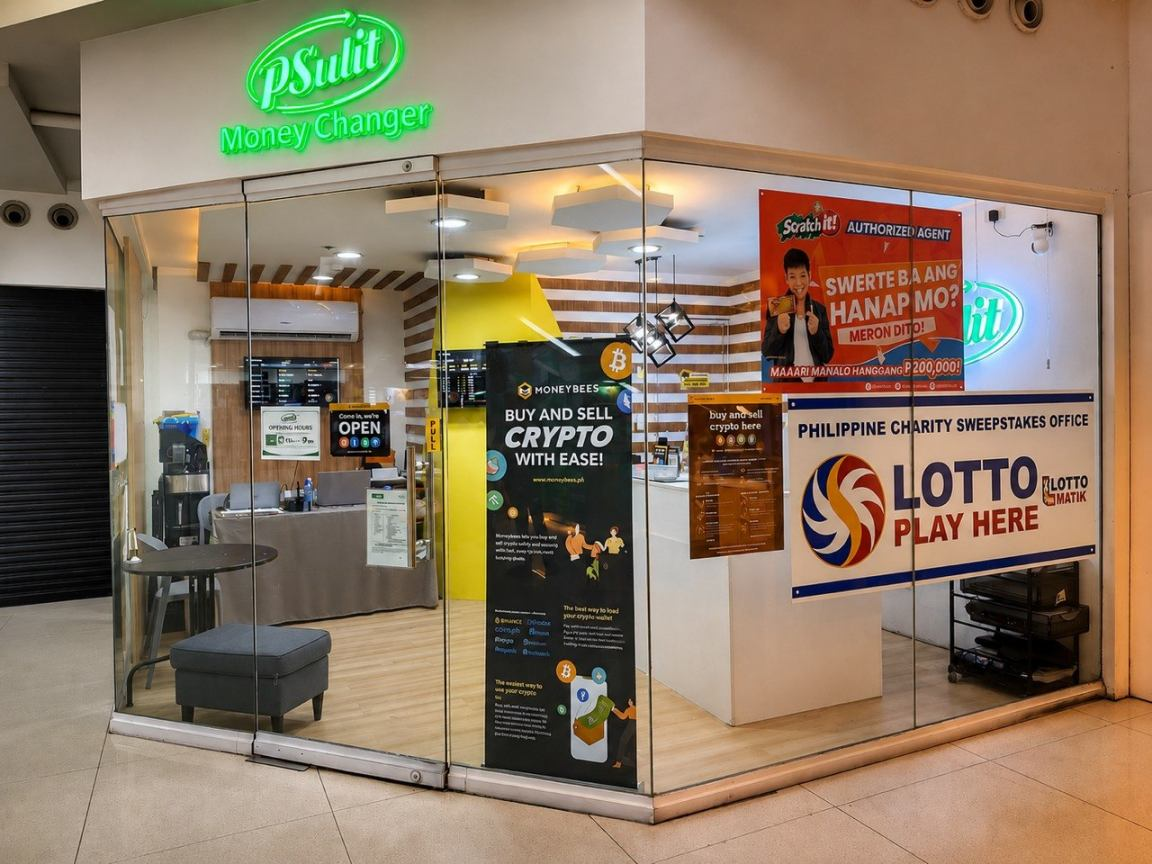 The glass-front PSULIT outlet at Alphaland Southgate Mall, with its green illuminated sign